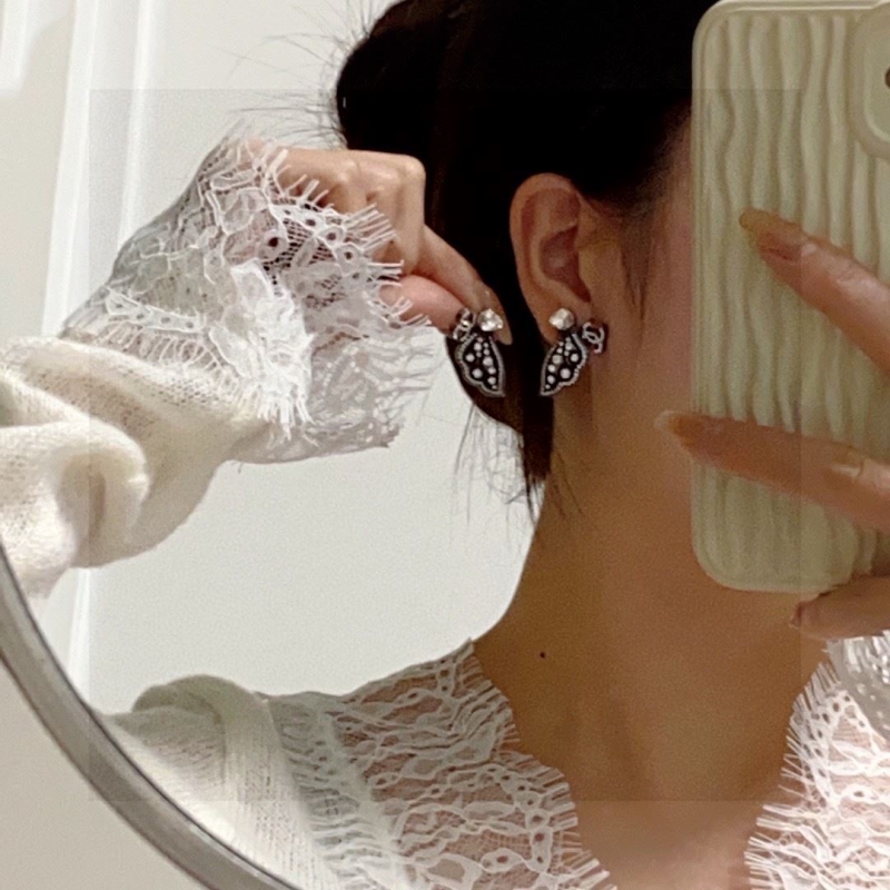 Ch*el earrings